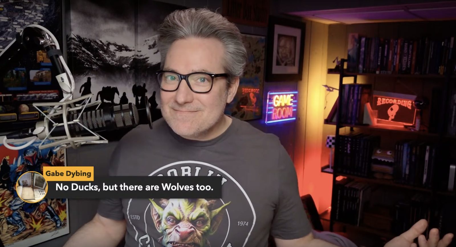 Sean live on stream in his game room, chat comment overlaid